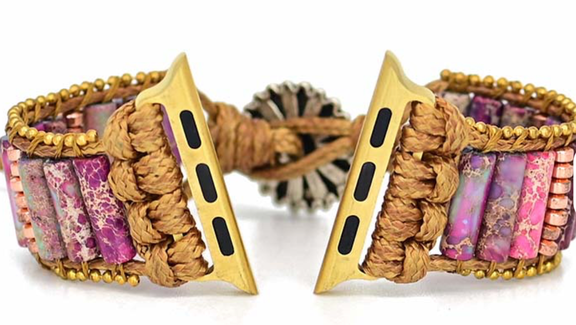 Violet Meadow Apple Watch Band with handwoven natural cord, violet and pink stone beads, gold-toned accents, and silver floral clasp