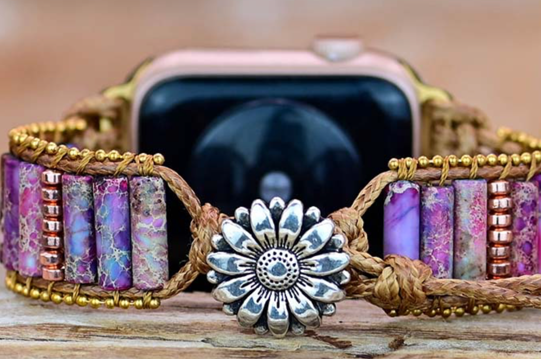 Violet Meadow Apple Watch Band with handwoven cord, purple stone cylinders, gold-toned beads, and silver floral clasp