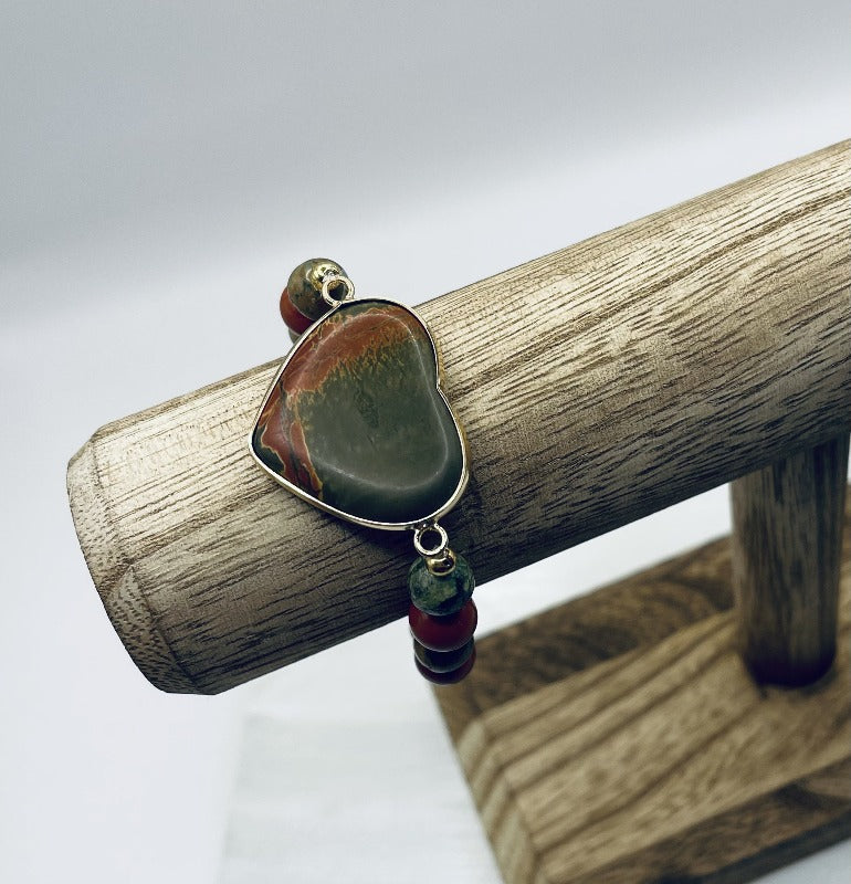 The Calming Bracelet features red jasper and rhyolite